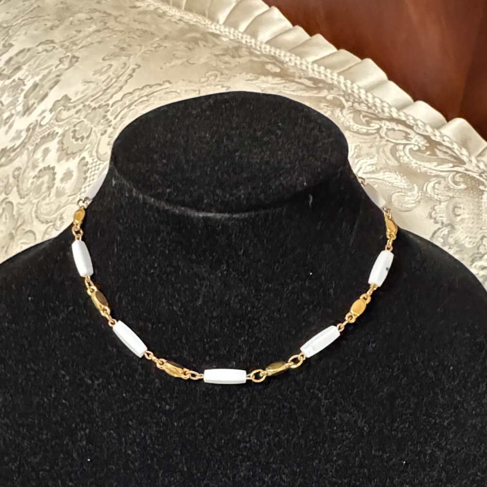 Elegant Gold and White Necklace